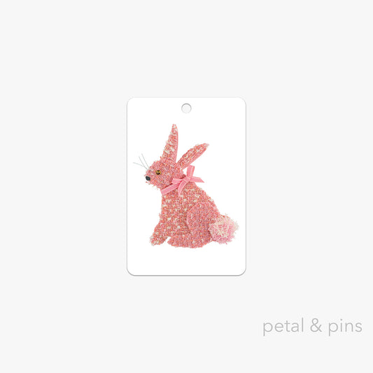 rabbit gift tag by petal & pins featuring a pink bunny with a bow on a white background