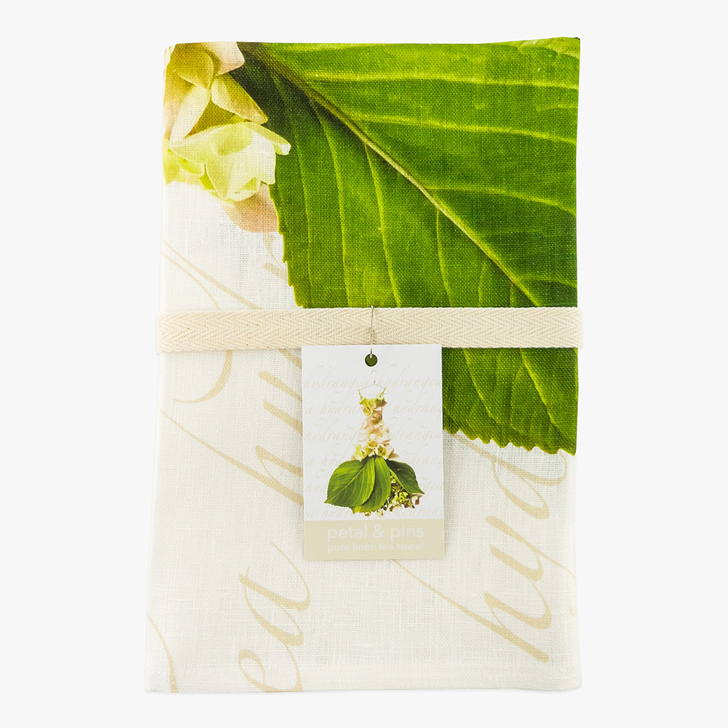 cream hydrangea gown pure linen tea towel by petal & pins - folded with cotton twill band and tag