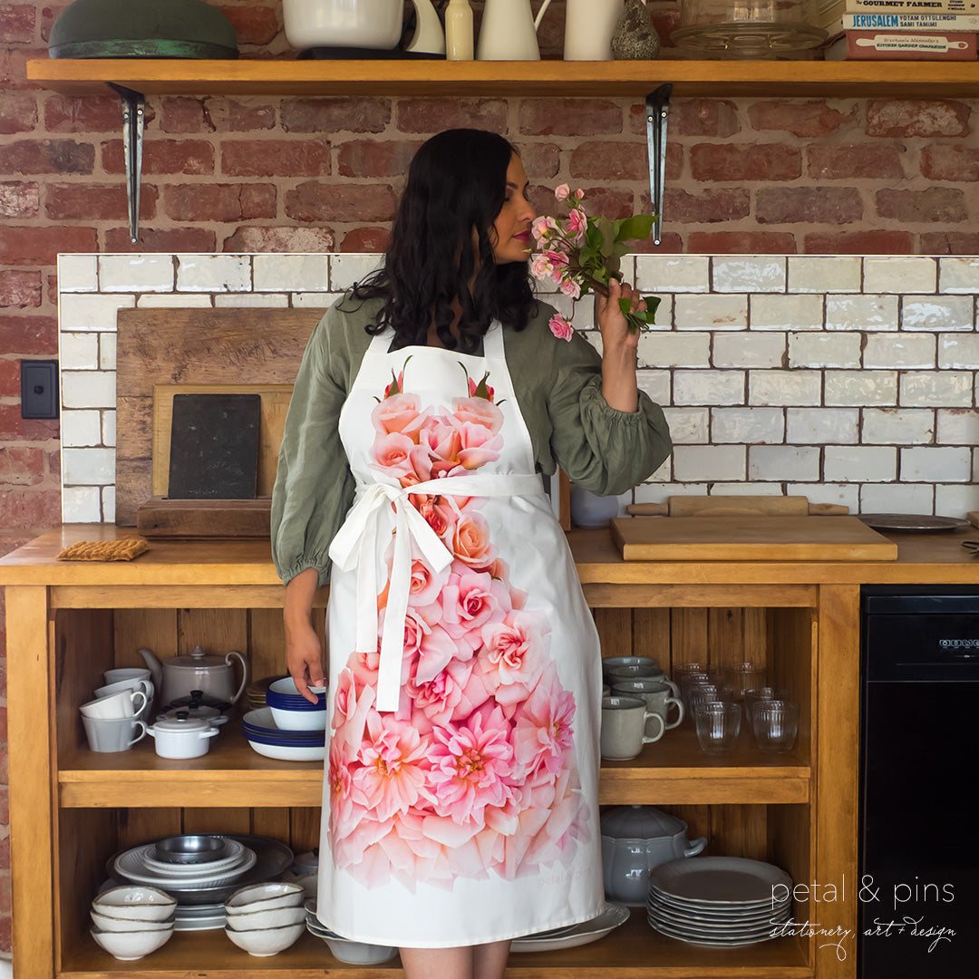Cécile Brünner rose apron by petal & pins - styled with model in kitchen