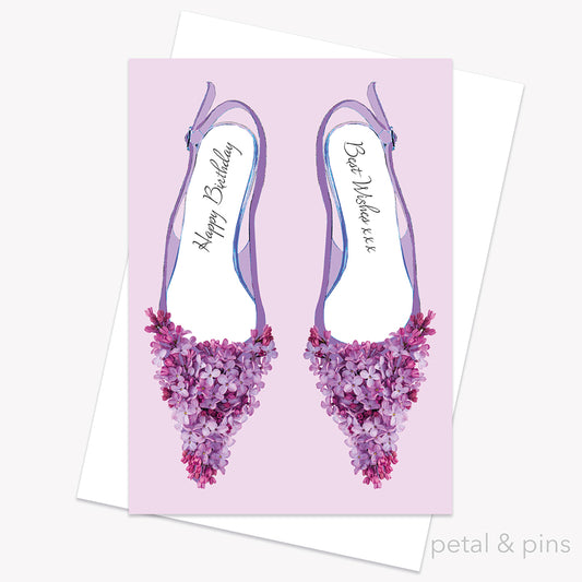 Greeting card with floral high heels and 'Happy Birthday' text on a lilac background by petal & pins.